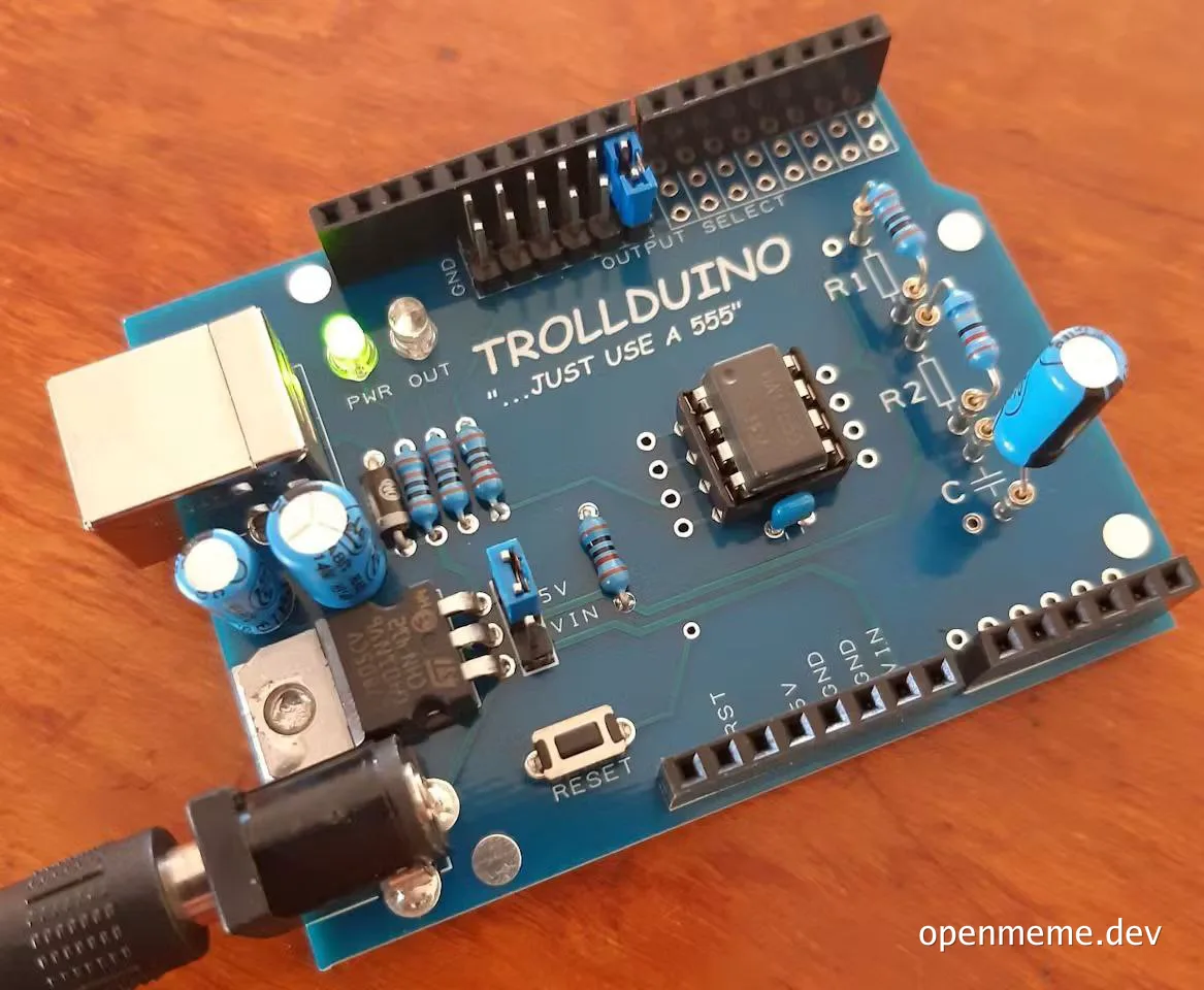 Trollduino circuit board with the text 'TROLLDUINO ...JUST USE A 555'