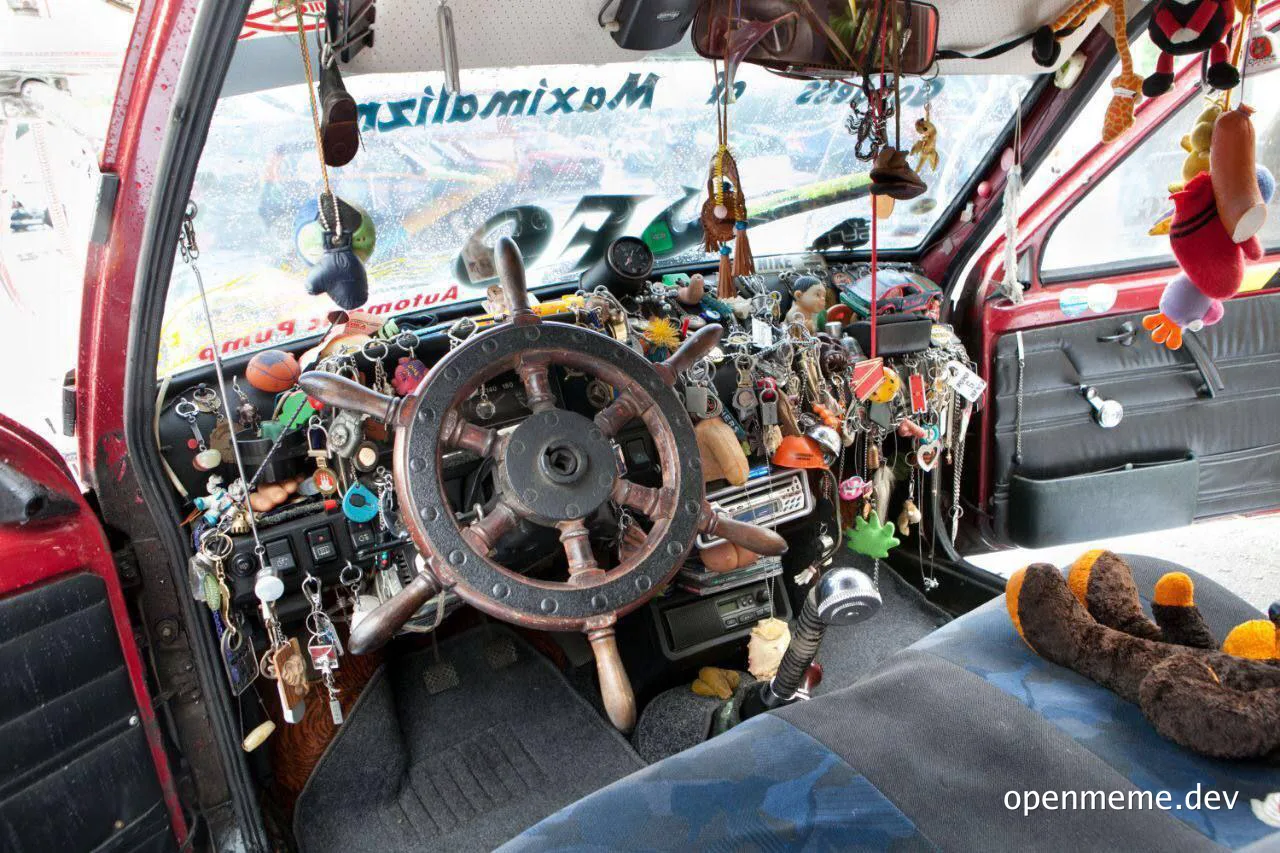 Cluttered car interior with numerous keychains and trinkets