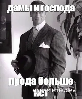 man in suit holding hat with russian text