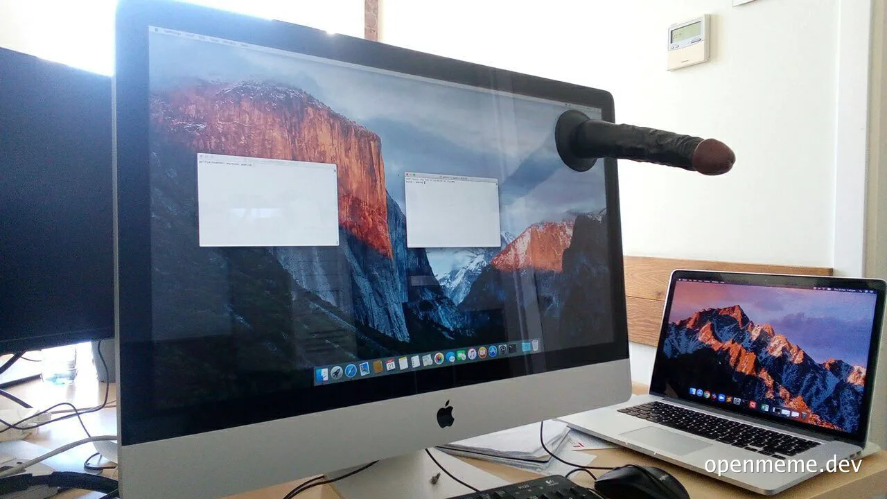 Apple desktop with microphone on screen