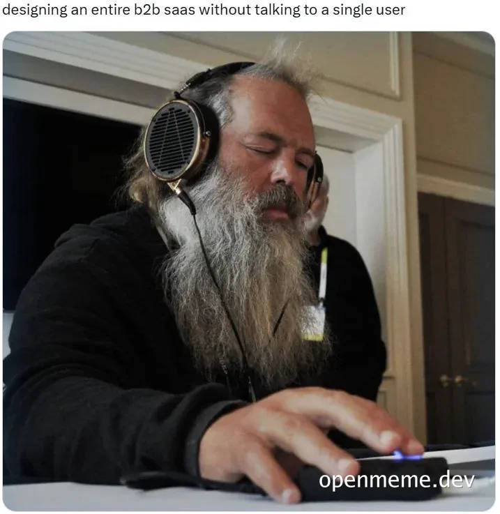 man in headphones designing b2b saas without user research