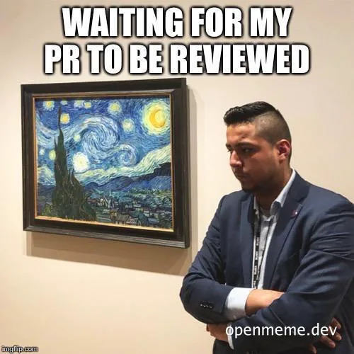 Man in a suit looking at Starry Night painting with text 'WAITING FOR MY PR TO BE REVIEWED'