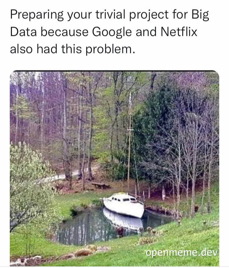 a white boat sits in a small pond surrounded by trees
