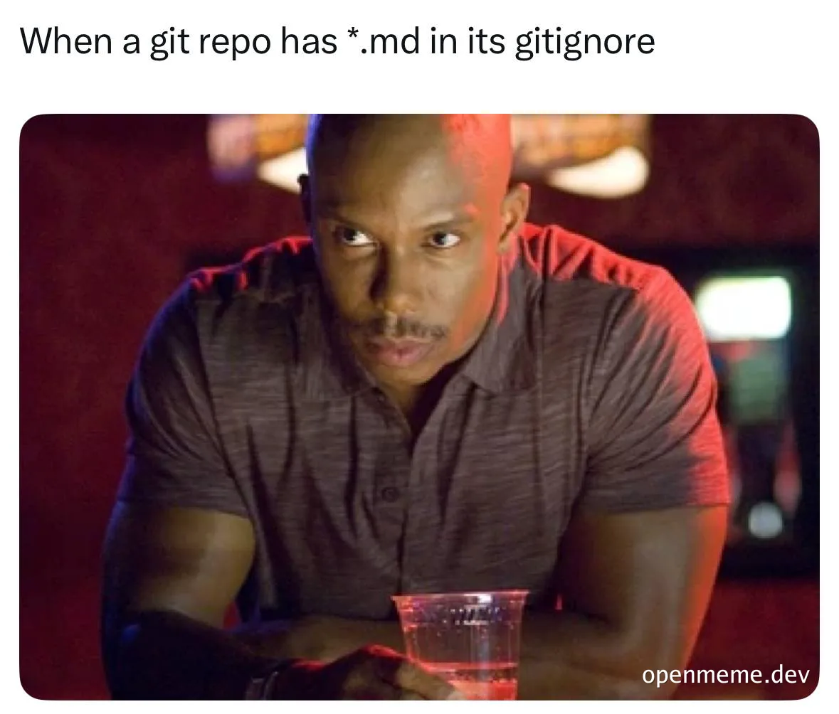 Confused man looking at a drink with a git repo error message in the background