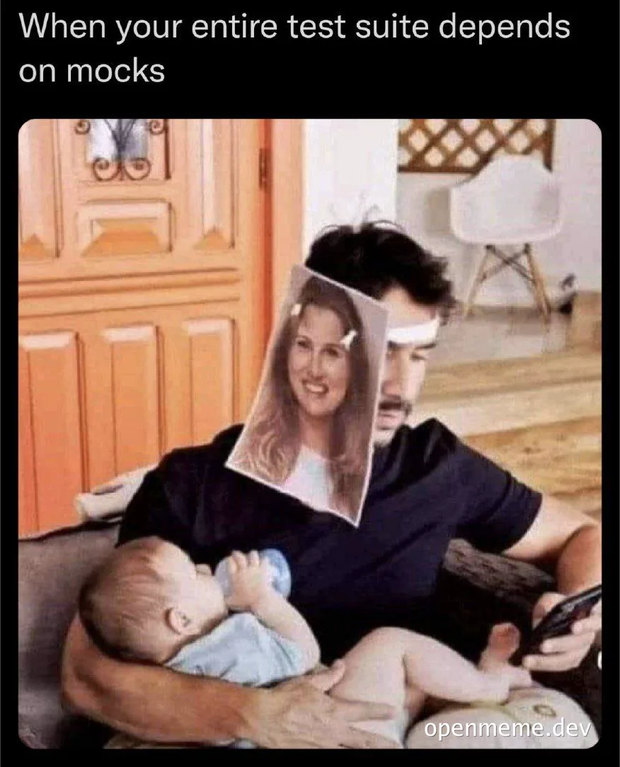 man holding baby with woman's face on his face