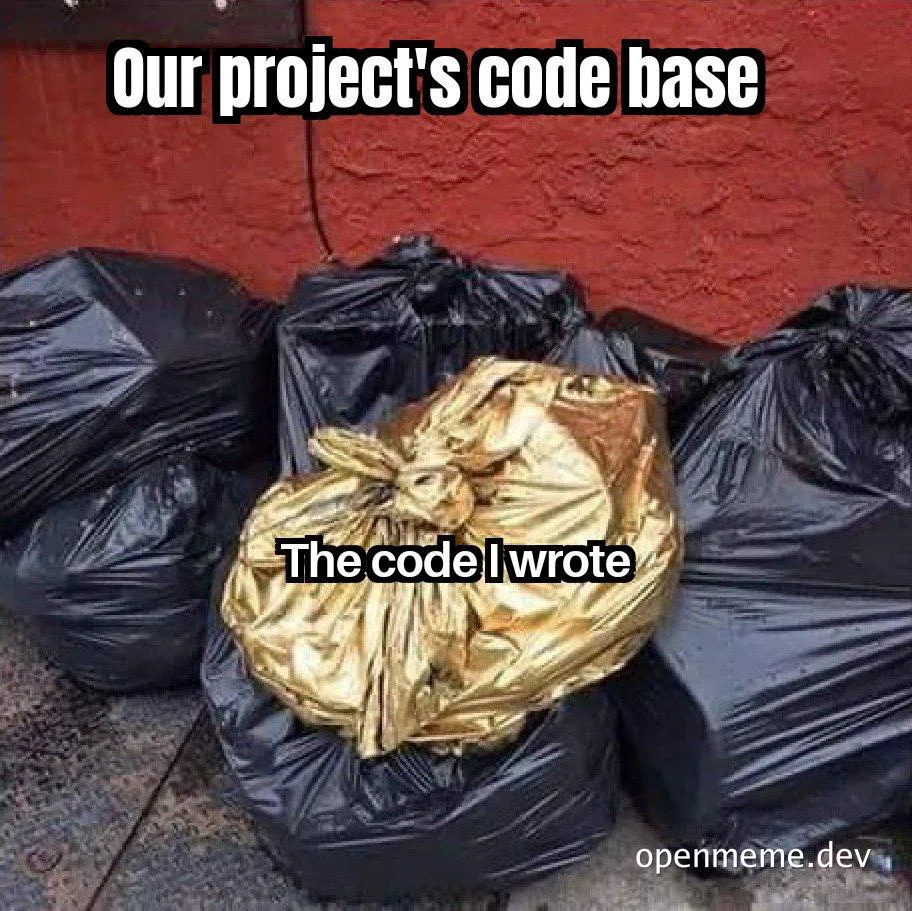 trash bags with one shiny gold bag on top