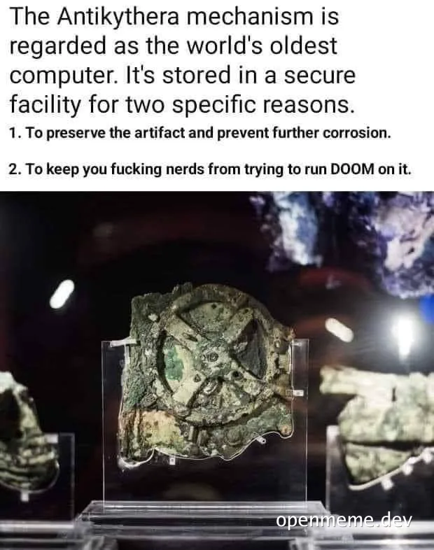 The Antikythera mechanism on display in a secure facility with a humorous caption about running DOOM