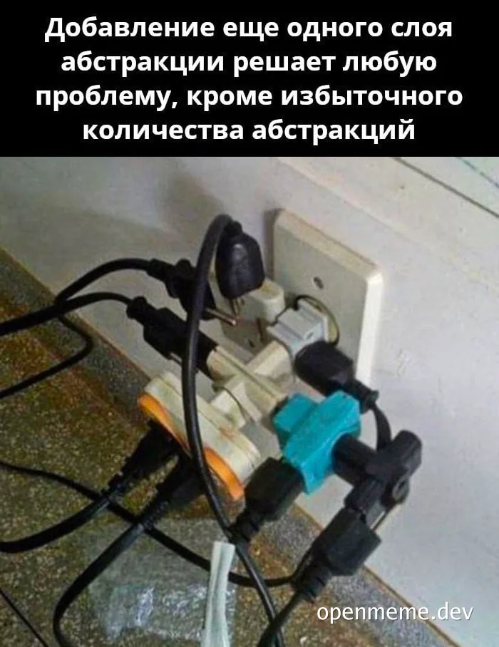 overloaded electrical outlet with many plugs