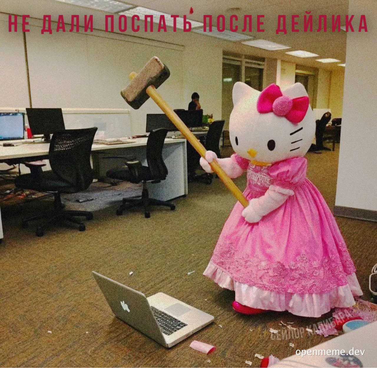 Hello Kitty in pink dress smashing laptop with sledgehammer in office