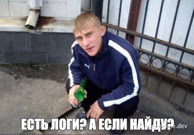Man in blue jacket crouching with a bottle, looking for something