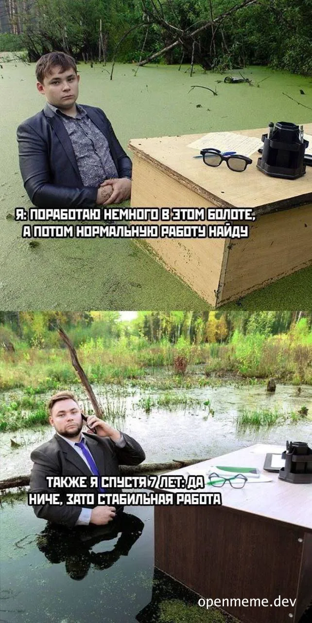 man in suit sitting in swamp with desk and chair