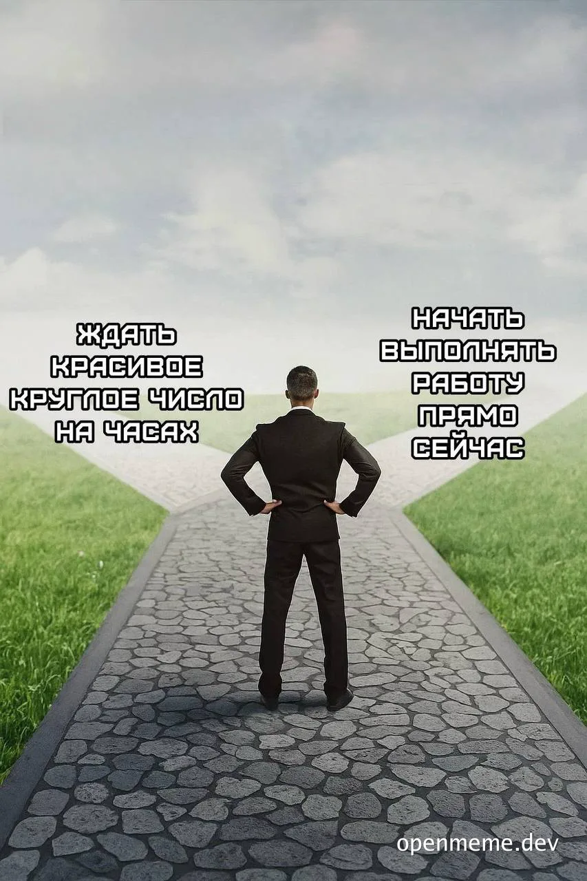 Man in a suit standing on a path with two options