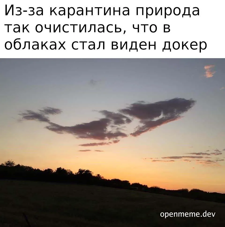 a landscape photo of a sunset with a cloud shaped like a docker container