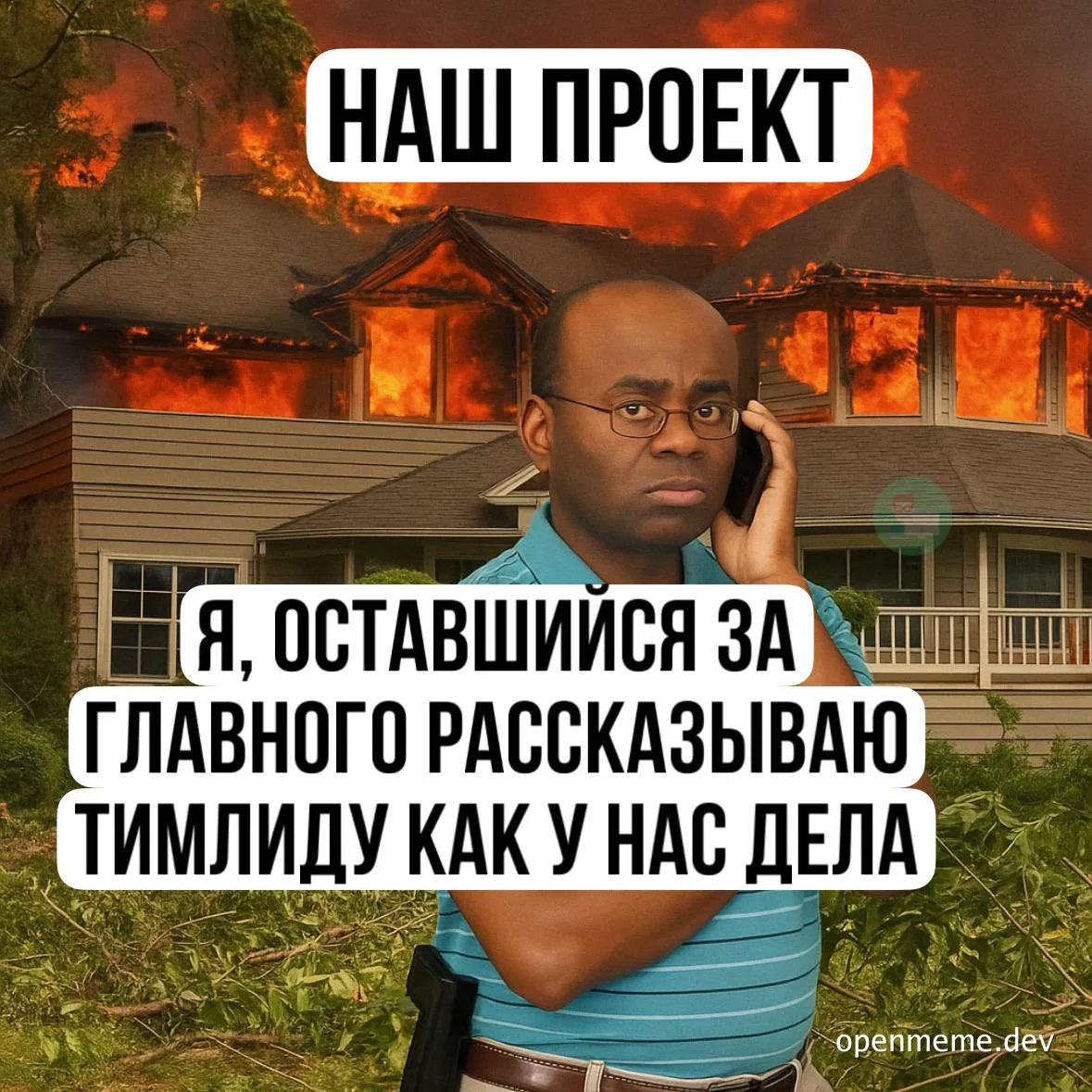 Man in front of burning house on phone