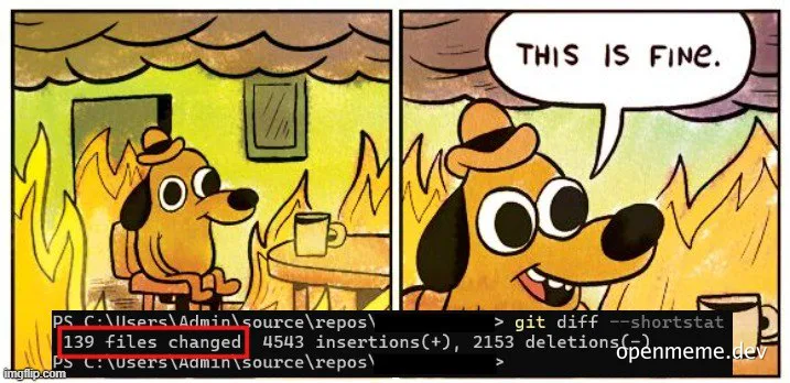 Dog sitting calmly in a burning room with a cup of coffee and a Git diff result showing many file changes, with the caption 'This is fine'