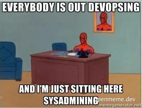 Spiderman sitting at a desk with the caption 'Everybody is out devopsing and I'm just sitting here sysadmining'