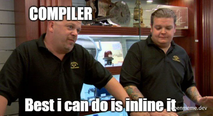 Two men in black shirts discussing compiler optimization