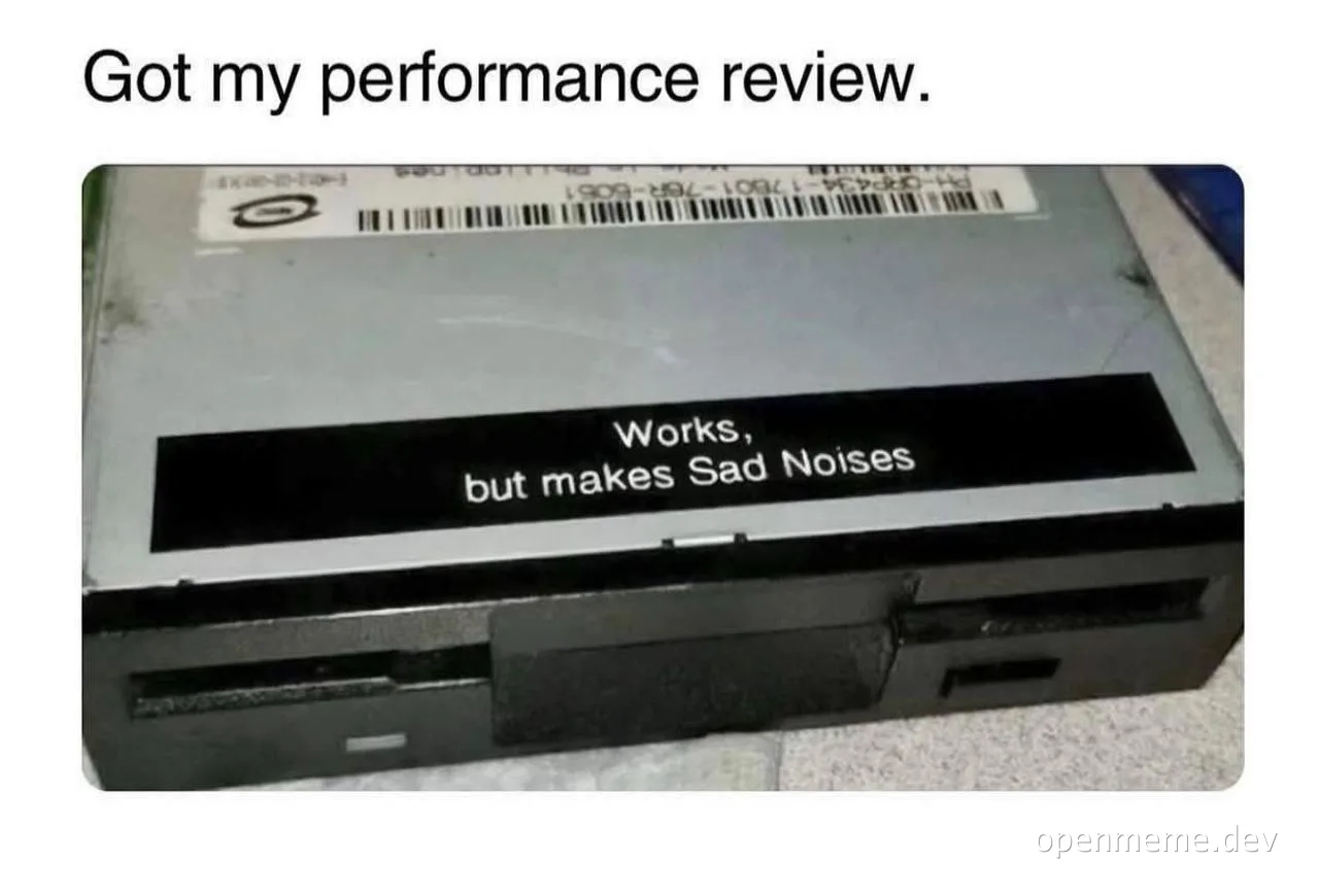 Hard drive with sticker saying 'Works, but makes Sad Noises'