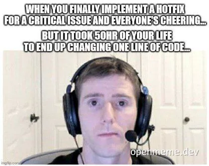 Disappointed developer with headset on, looking sad after fixing critical issue with one line of code