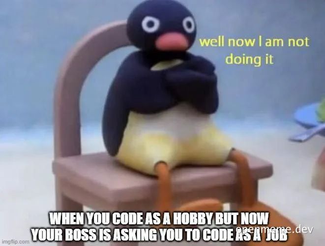 funny penguin toy sitting on chair with arms crossed