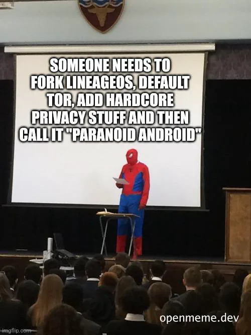 Spiderman on stage in front of a projector screen with text about creating Paranoid Android