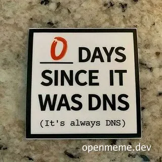 Sticker with text '0 DAYS SINCE IT WAS DNS (It's always DNS)' on a marble background