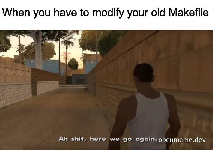 Grand Theft Auto screenshot of a character walking down a narrow alley with a reluctant expression, with text 'When you have to modify your old Makefile' and 'Ah shit, here we go again'