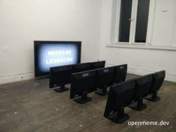Multiple computer monitors with a TV displaying 'Machine Learning' in the background