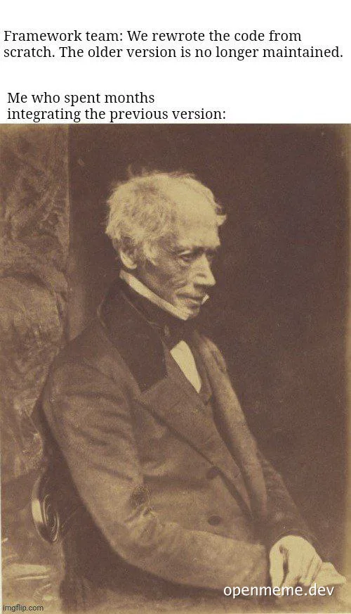 Disappointed man sitting in chair looking down