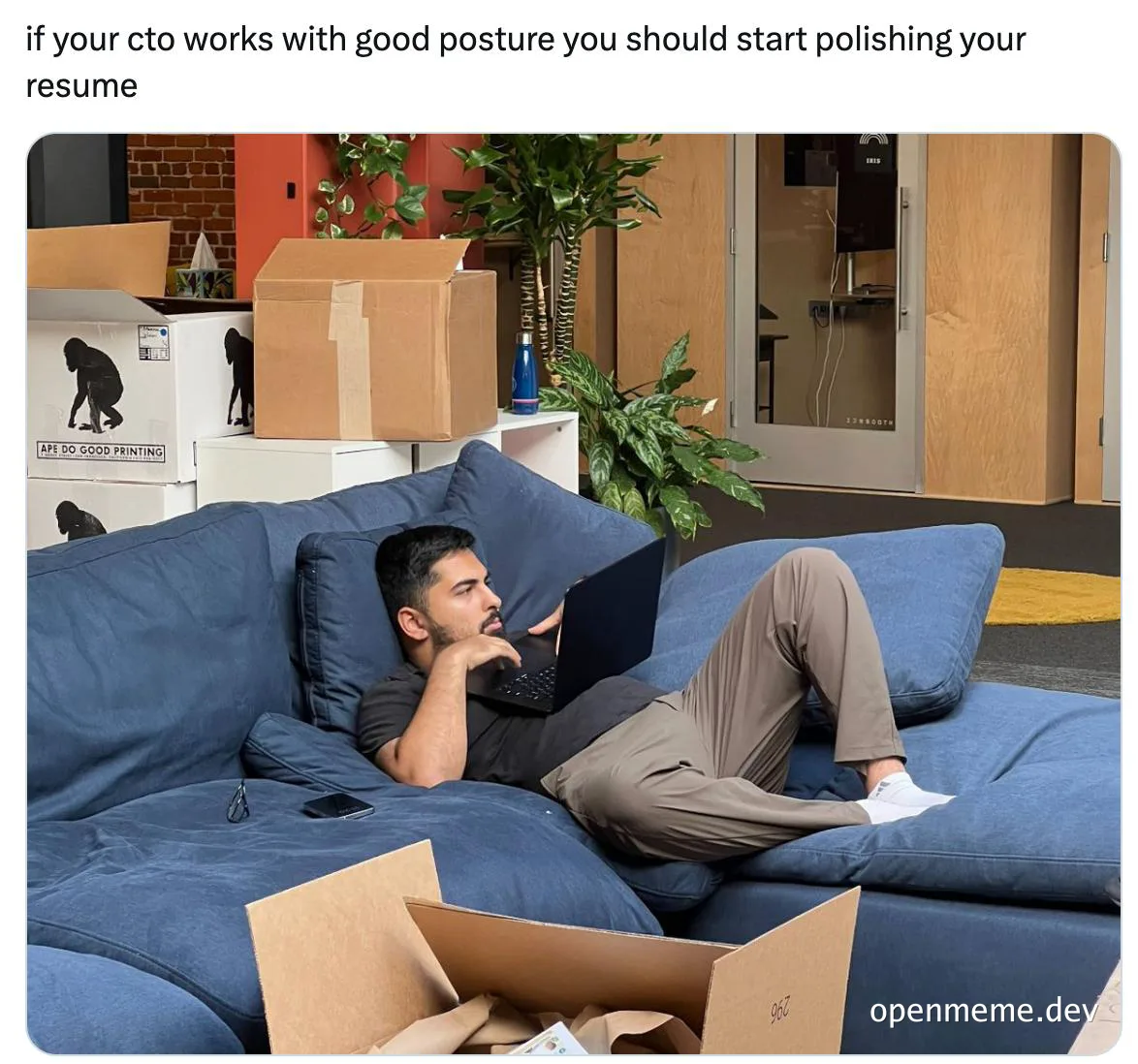 man lounging on a blue couch with laptop, surrounded by boxes, with a caption about cto posture and resume polishing