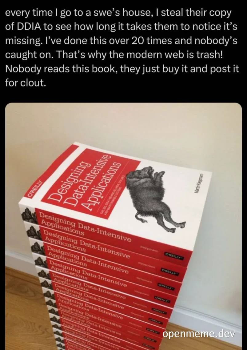 Stack of 'Designing Data-Intensive Applications' books with a humorous caption about stealing them
