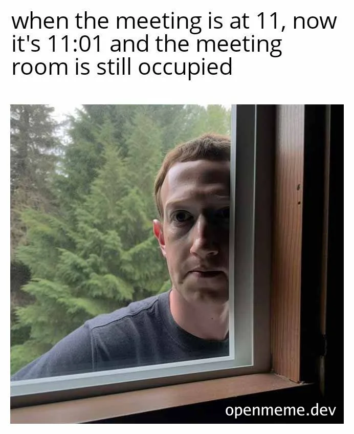 man looking through window with worried expression
